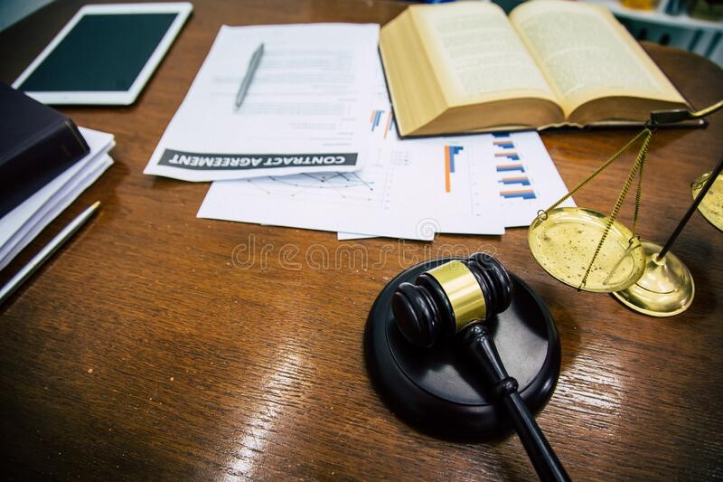 a table that full of legal business documents