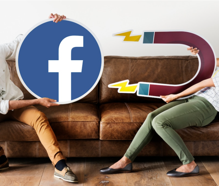 people holding a facebook logo