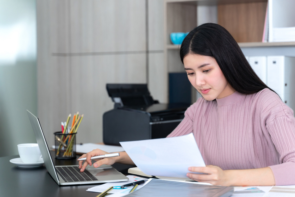 Woman calculating her finances