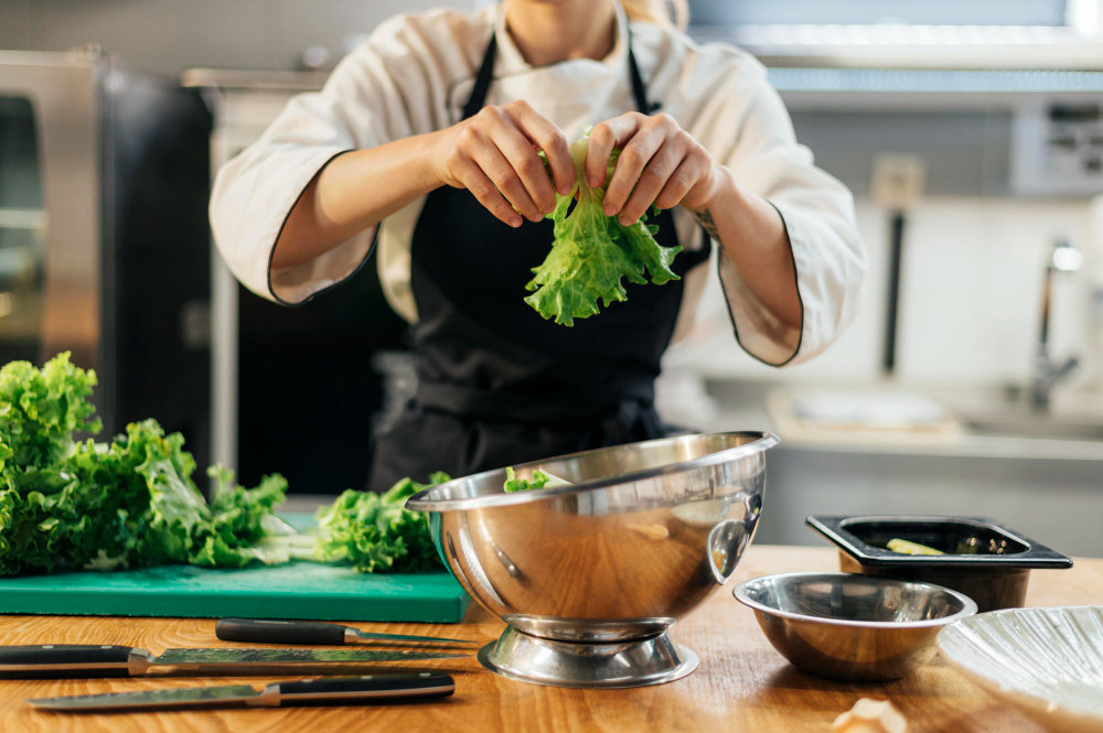 A chef preparing salad