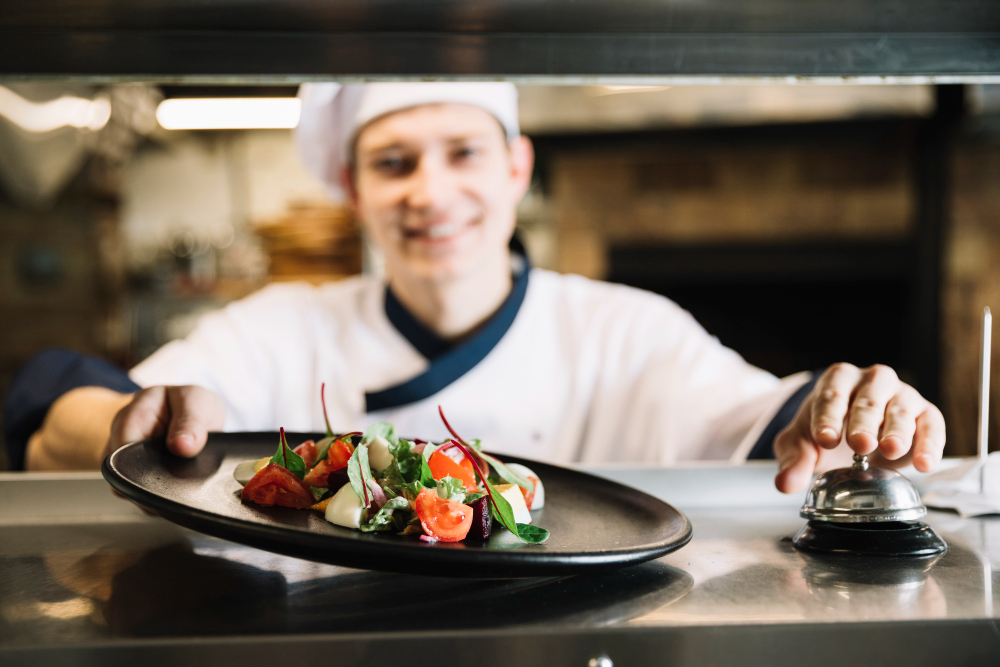 A chef serving a dish